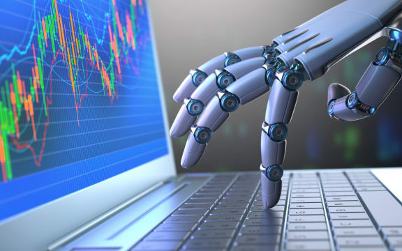 robot hand on laptop