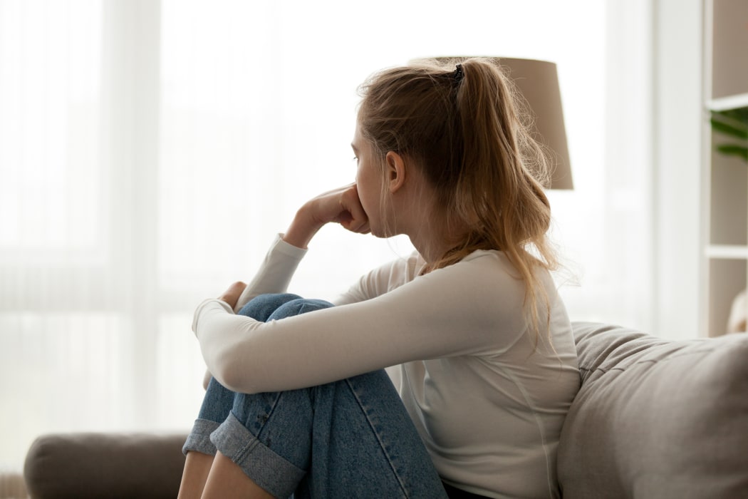 Anxious young woman at home. (File image)