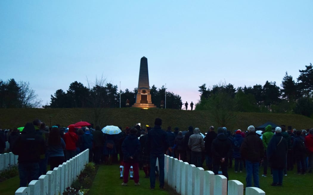 The Anzac dawn service at Buttes New British Cemetery in Polygon Wood, where 162 New Zealanders and 564 Australian soldiers are buried.