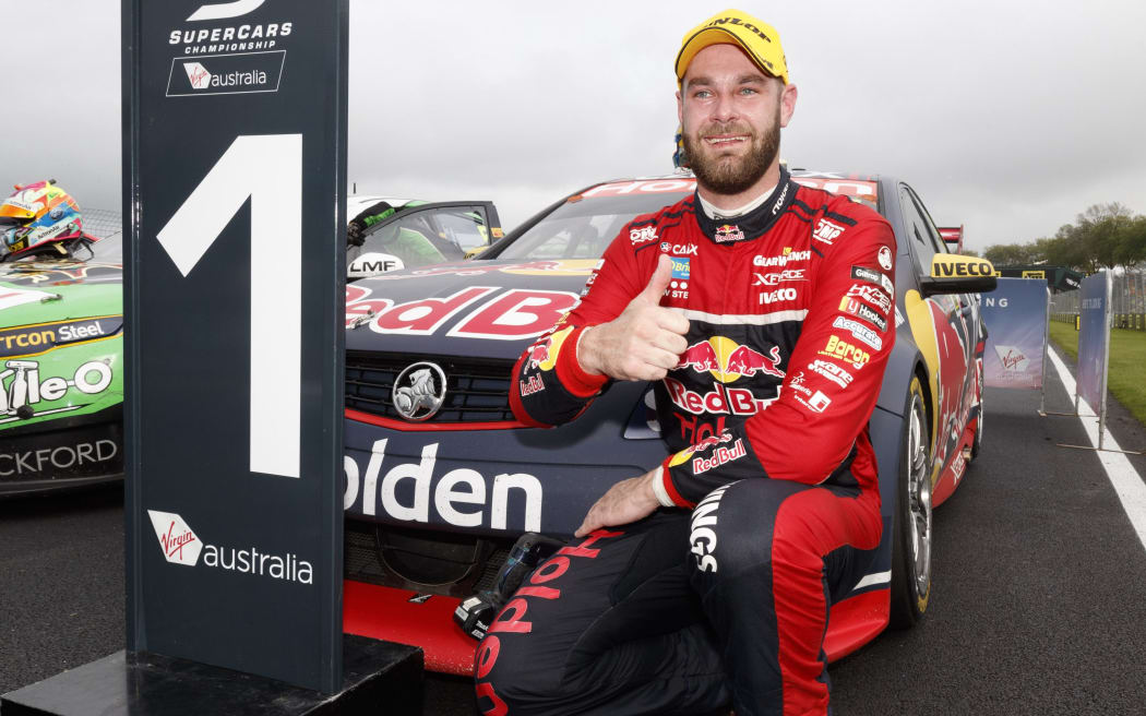 Shane van Gisbergen celebrates race victory.