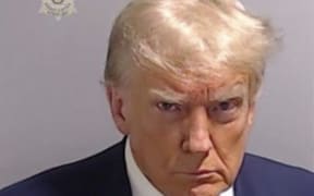 This handout image released by the Fulton County Sheriff's Office on August 24, 2023 shows the booking photo of former US President Donald Trump. Former US president Donald Trump was photographed for a police mug shot after his arrest on August 24 at the Fulton County Jail in Georgia, multiple US media outlets reported citing local officials.