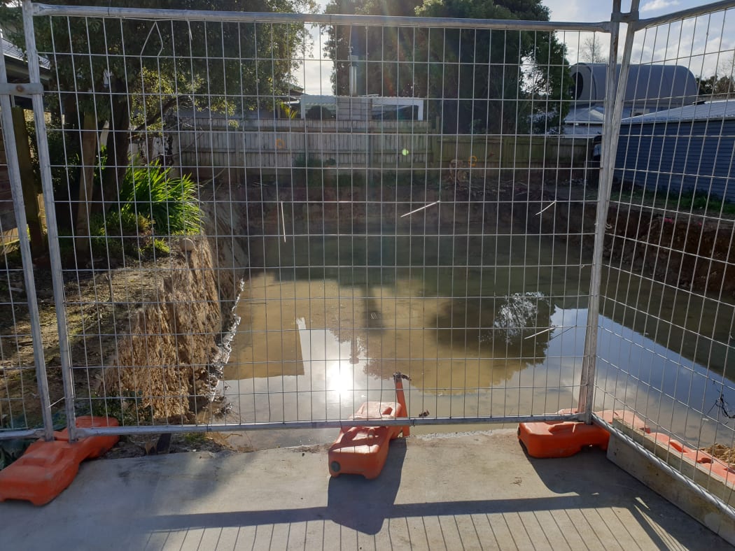 Hanna Carpenter says the lack of a secure fence is putting her children's lives in danger.