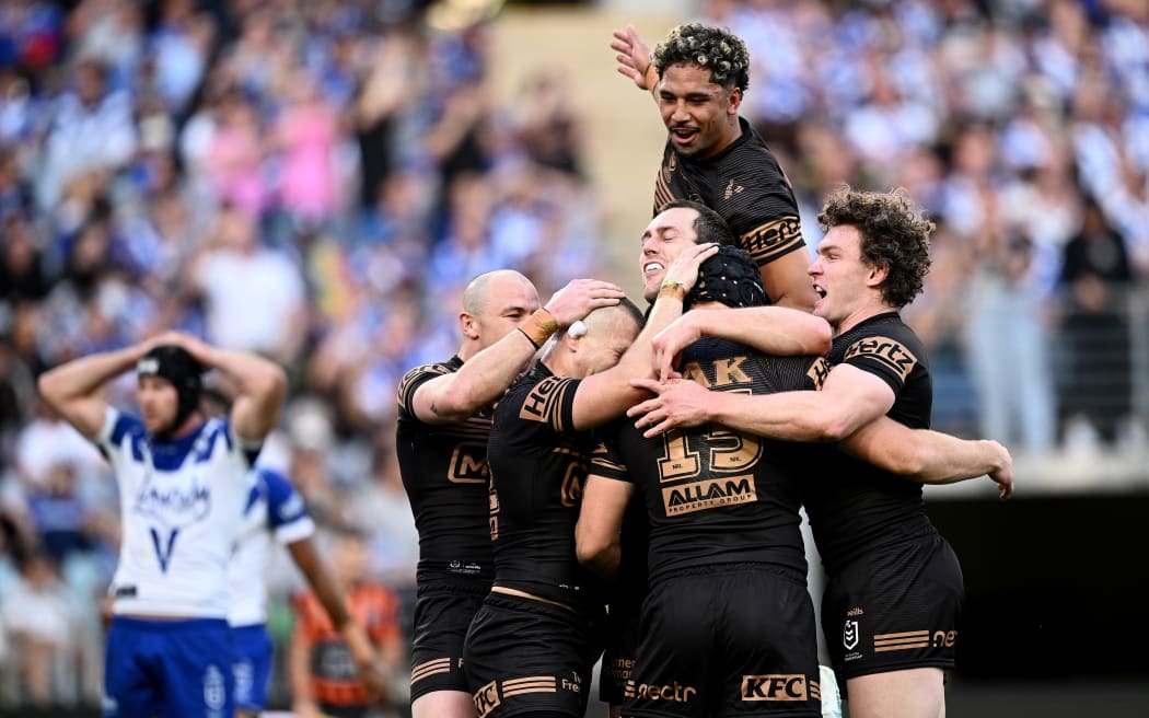 Penrith Panthers celebrate a try against the Canterbury Bulldogs.