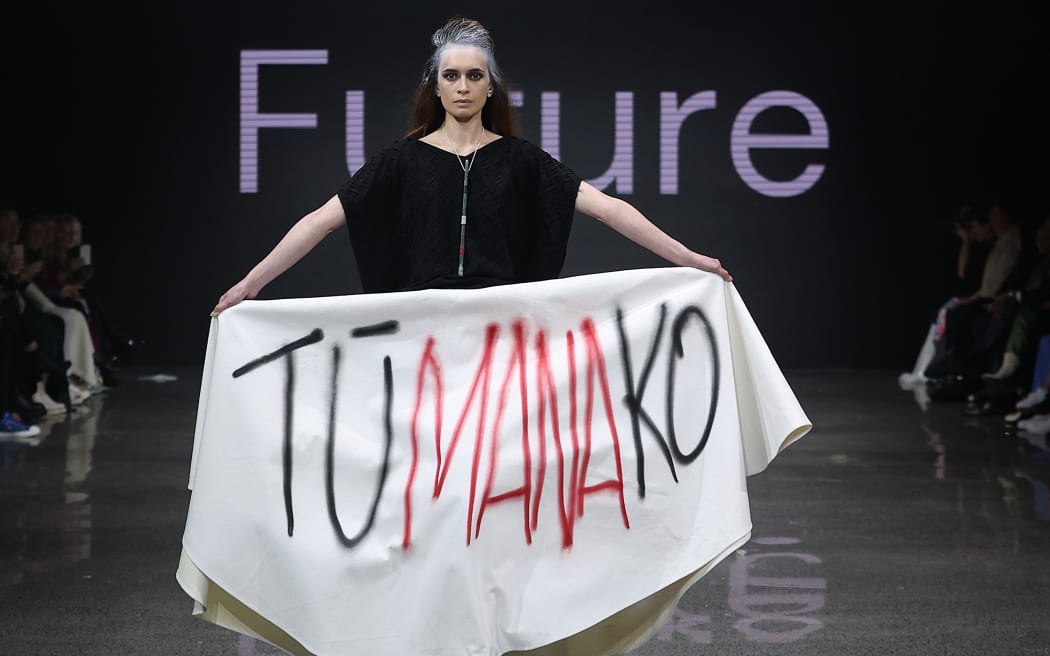 AUCKLAND, NEW ZEALAND - AUGUST 29: A model walks the runway during the Kiri Nathan show during New Zealand Fashion Week 23: Kahuria at Viaduct Events Centre‎ on August 29, 2023 in Auckland, New Zealand.