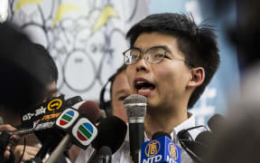 Hong Kong democracy activist Joshua Wong speaks to the media after leaving Lai Chi Kok Correctional Institute in Hong Kong on June 17, 2019.