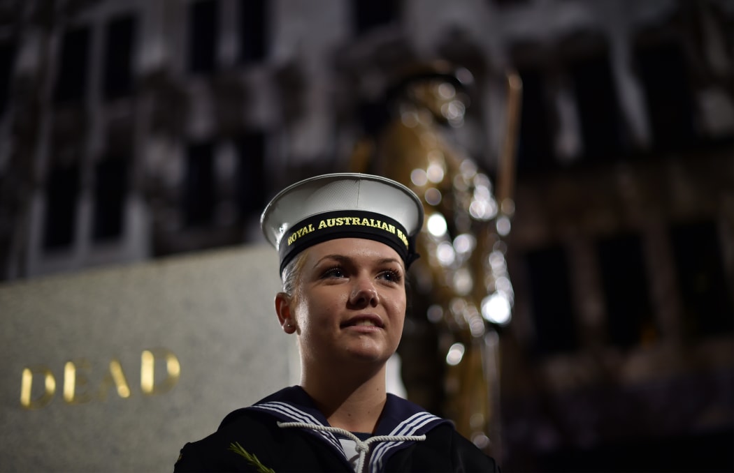 An Australian soldier stands in front of the Cenotaph following a dawn service to mark the centenary of the Gallipoli landings in Sydney on April 25, 2016.