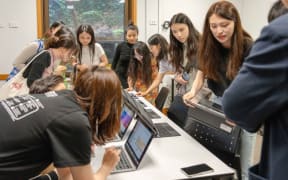 Students attend the launch of Chinese+AI Lab.
