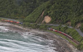 A train is trapped by landslides on the Kaikoura coast line.
