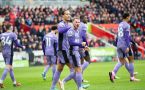 17th February 2024; Gtech Community Stadium, Brentford, London, England; Premier League Football, Brentford versus Liverpool; Alexis Mac Allister of Liverpool celebrates after he scored for 0-2 in the 55th minute