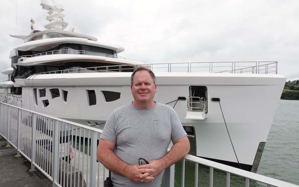 Captain Aaron Clark with Artefact at Ōpua wharf.