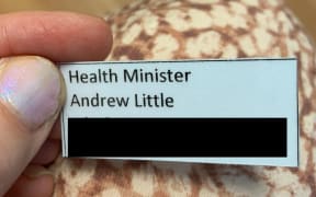 The card the woman says was handed to her by a nurse at Wellington Hospital's overcrowded ED so she could complain to the Health Minister.