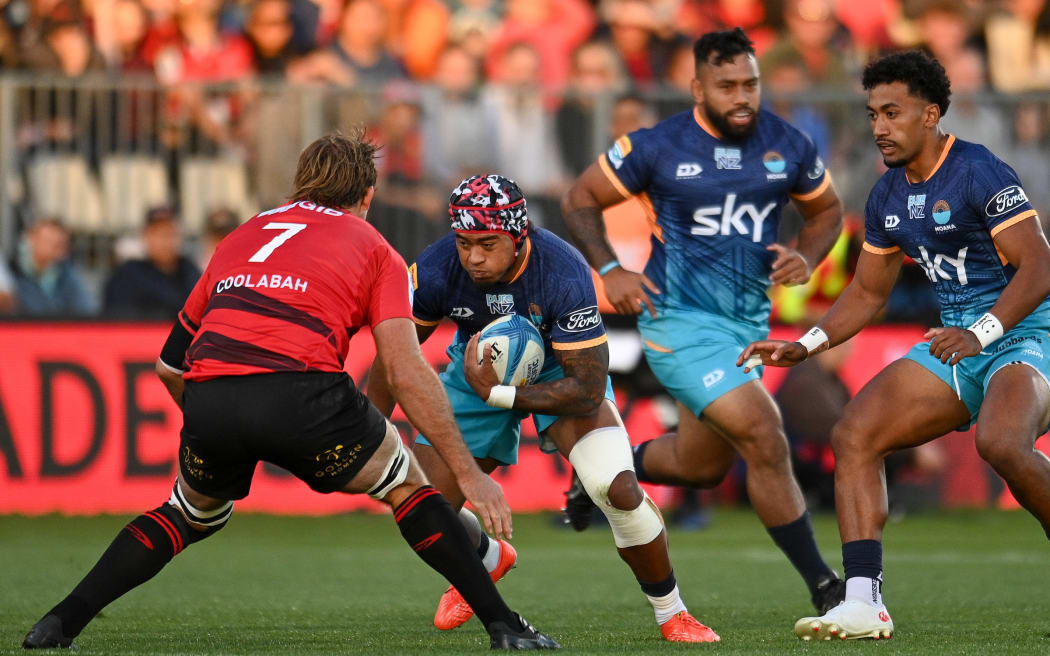 Danny Toala of Moana Pasifika is tackled by Ethan Blackadder of the Crusaders during the Super Rugby Pacific - Crusaders v Moana Pasifika at Apollo Projects Stadium, Christchurch, New Zealand, 29th March 2025. Copyright photo: John Davidson / www.photosport.nz