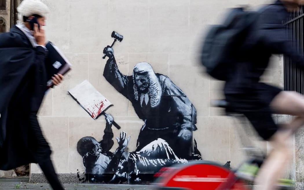 The artist posted an image of the work, which features a judge wielding a gavel over a protester on the ground holding a blood-splattered placard, on his Instagram page.