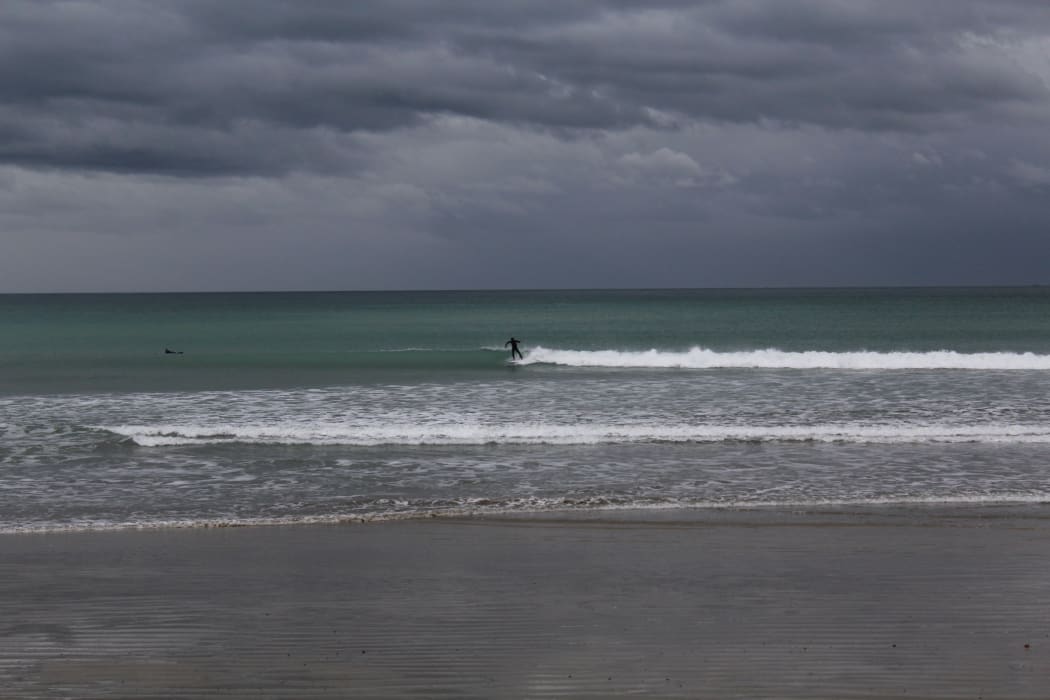 Colac Bay is a popular surfing spot. In the middle of the day on Tuesday, ten people were out catching waves.