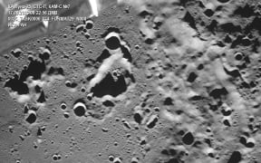This handout photograph taken by the Luna-25 rover before its mission failed and released by Russian Space Agency Roscosmos on 17 August 17, 2023, shows the Zeeman lunar impact crater on the far side of the Moon.