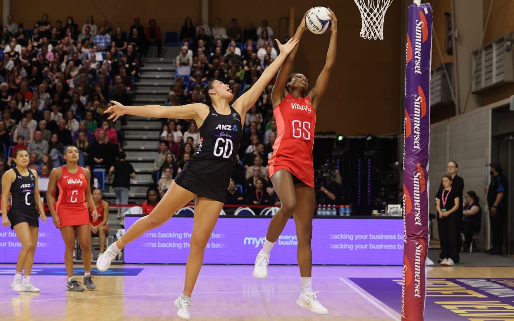 Silver Ferns Parris Mason (L) with England Liv Tchine during game 2 of the Taini Jamison Trophy.