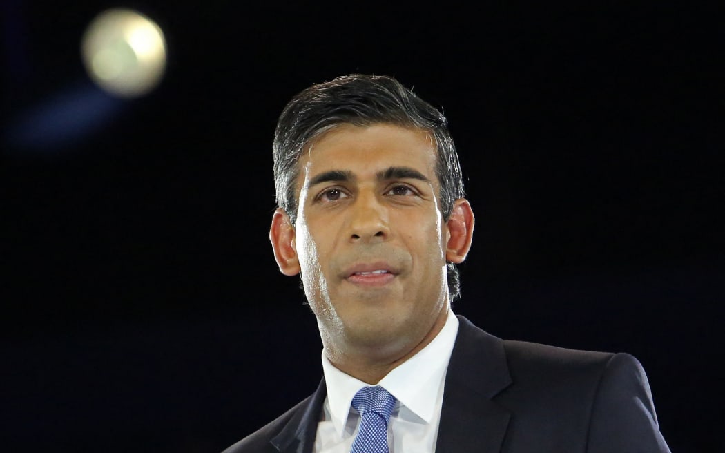 Rishi Sunak, Britain's former Chancellor of the Exchequer and a contender to become the country's next Prime Minister and leader of the Conservative party, answers questions as he takes part in the final Conservative Party Hustings event at Wembley Arena, in London, on August 31, 2022.