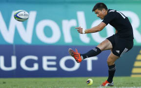 Otere Black kicks for goal