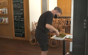 Leaf & Loaf cafe owner Stuart Wright says the traffic light signal system is confusing.
