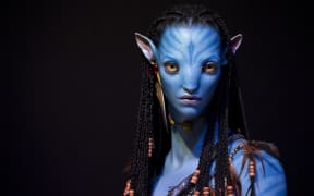 A character from 'Avatar' shown at a  3D exhibition in Paris.