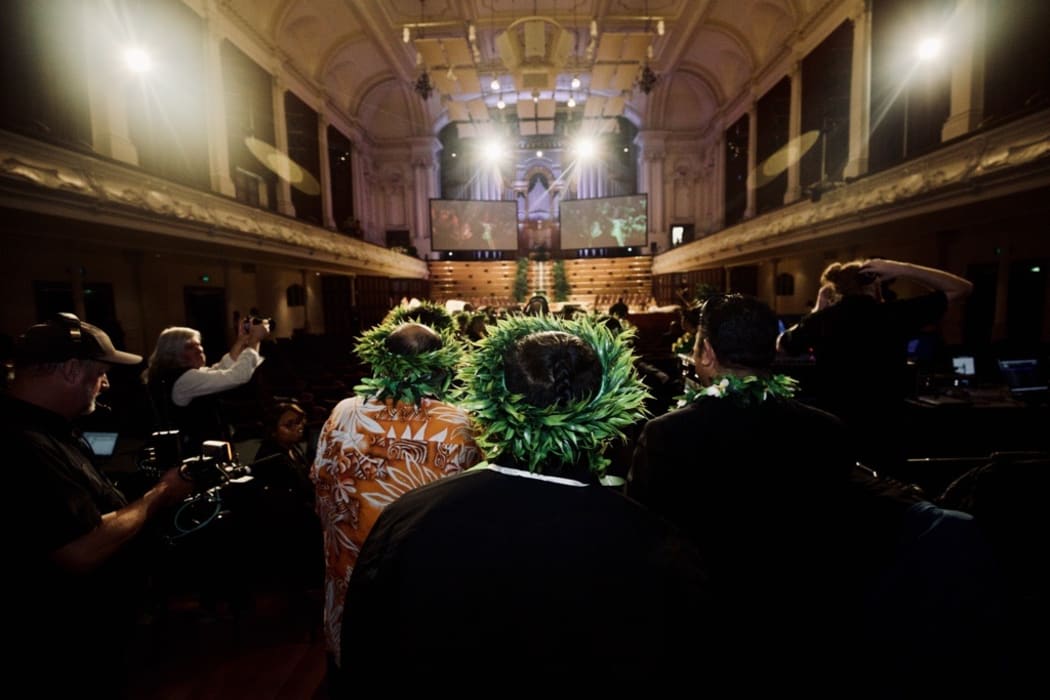 The Cook Islands community enter Town Hall.