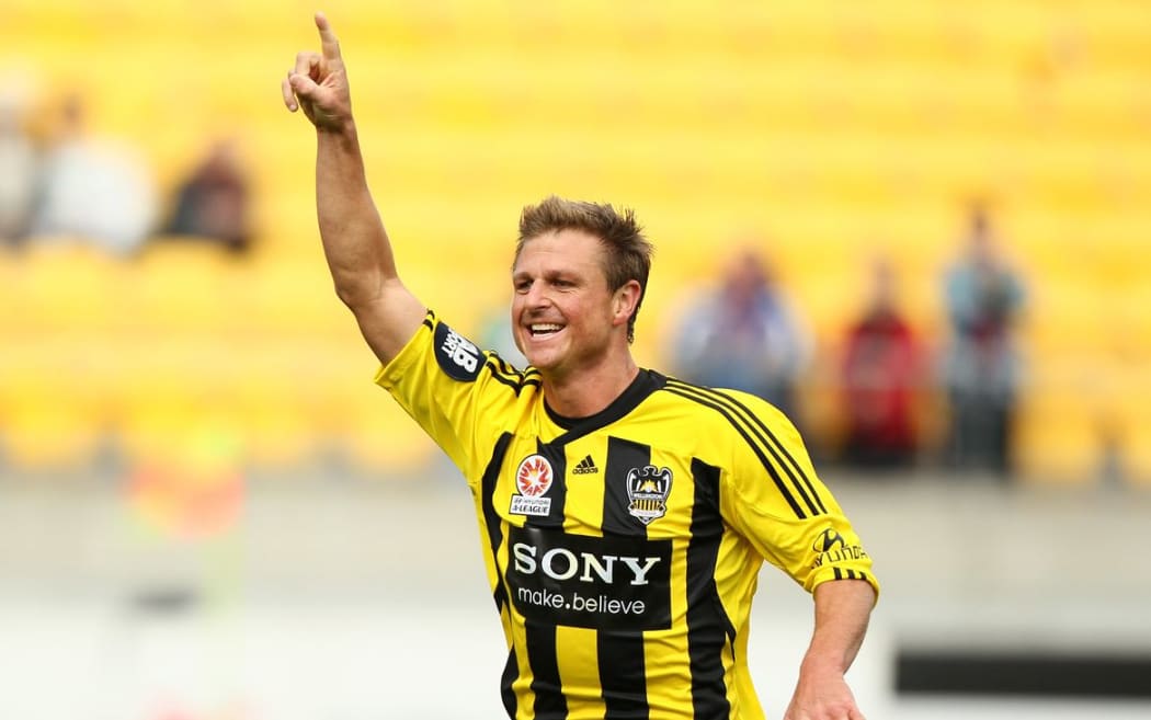 Wellington Phoenix defender Ben Sigmund celebrates Andrew Durante's goal against Gold Coast United at Westpac Stadium, Wellington, Sunday 4 March 2012. Photo: Justin Arthur / Photosport.co.nz