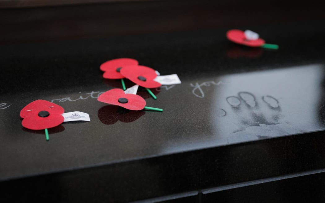 Anzac Day 2023 commemorations in Wellington.
People lay poppies at the conclusion of the dawn service.