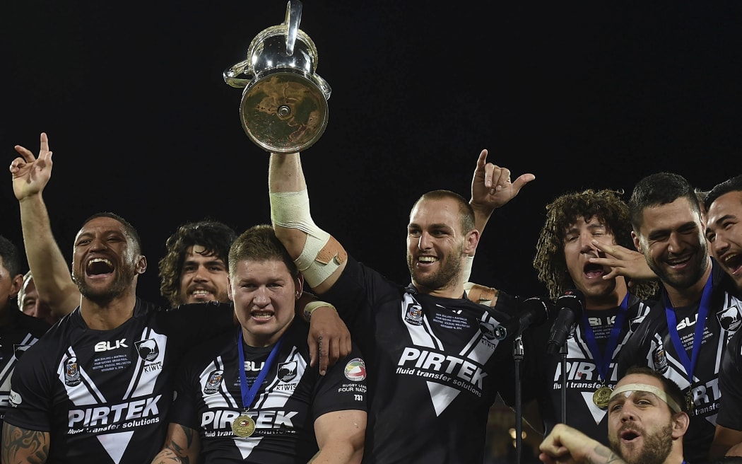 Simon Mannering and the Kiwis celebrate their 2014 Four Nations win.