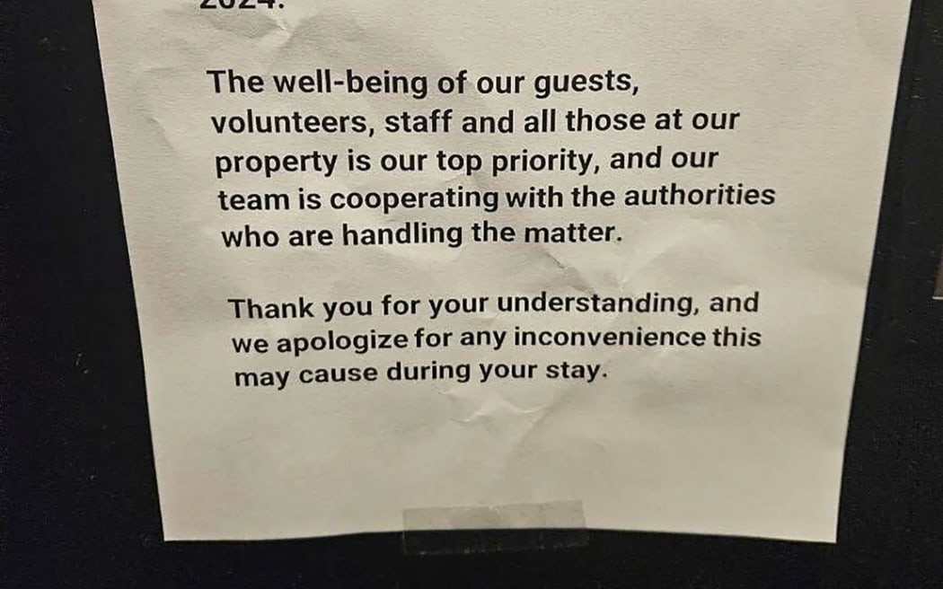 A flyer is seen at an Upper West Side hostel that a person of interest in the Brian Thompson homicide case checked into.