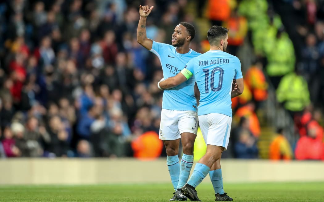 Manchester City's Raheem Sterling  thanks the fans after scoring a goal.