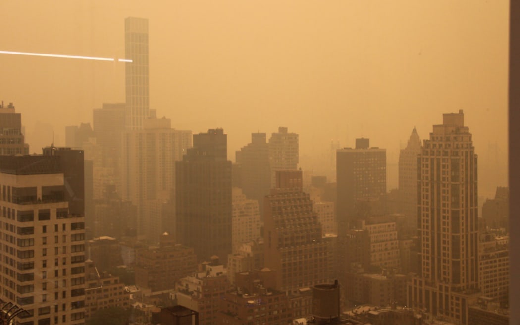 Smoke from the Canada wildfires blanketing New York City.