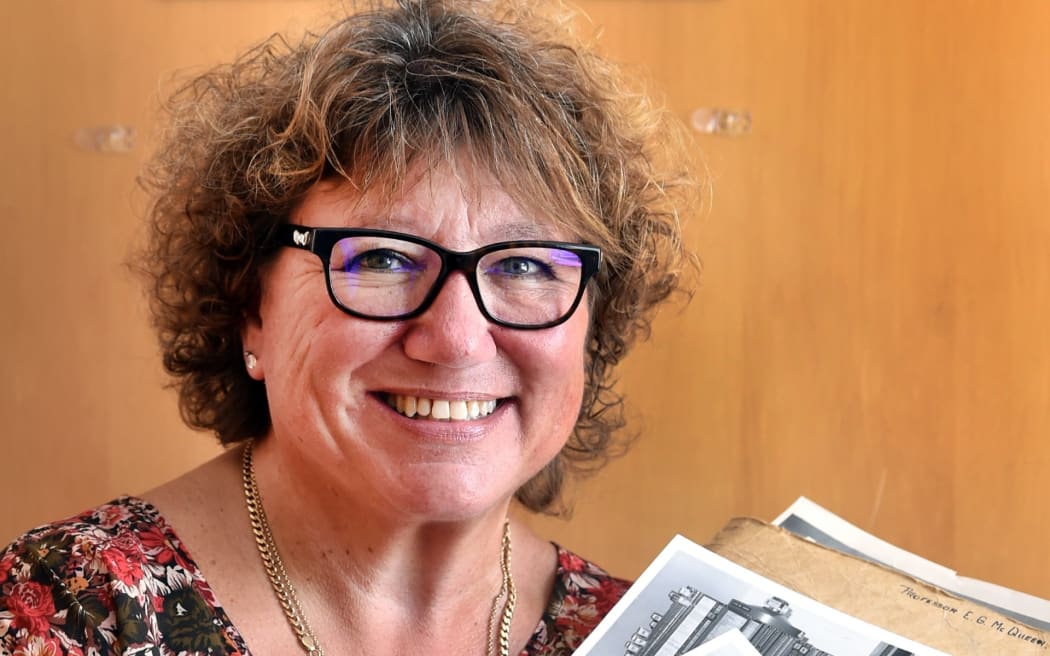 National Poisons Centre service delivery manager Lucy Shieffelbien holds some of the articles and photos from the centre’s 60-year history.