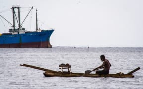 Large-scale and small-scale fishing in the waters off Madang in Papua New Guinea.