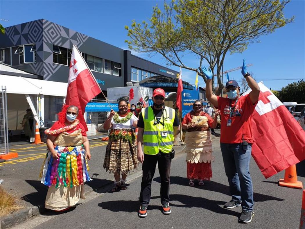Langimalie Supervax Event in Onehunga, Auckland run by the Tongan Health Society. The society's CEO Dr Glenn Doherty (middle) says they're giving 100 doses per hour.