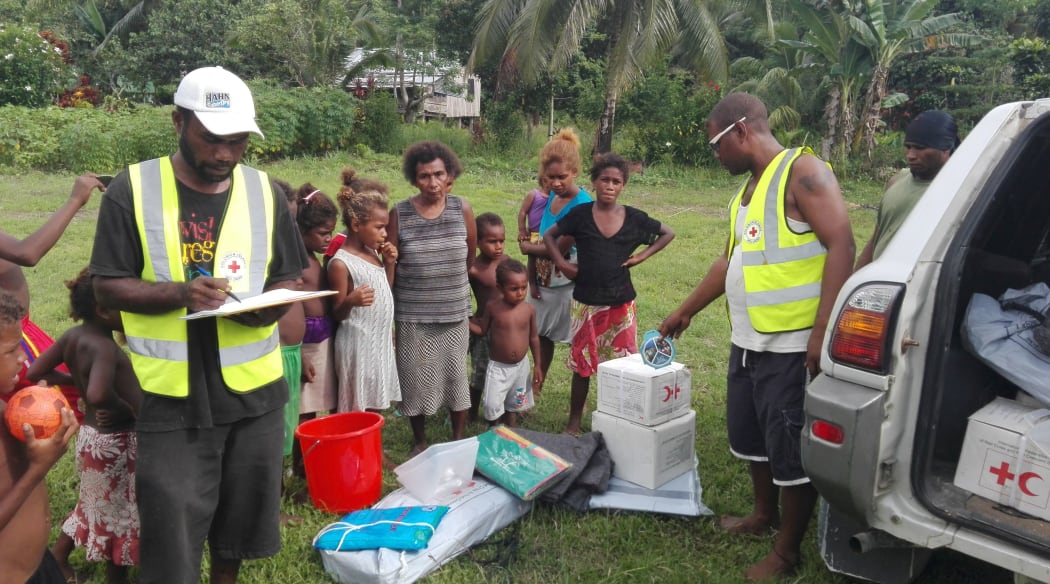 Villagers in Solomon Islands receive relief after a 7.8 magnitude earthquake struck on 9 December 2016