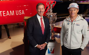 Skipper Jimmy Spithill (right) in front of the Americas Cup. BMW Oracle Team USA unveiling ceremony, Bermuda.