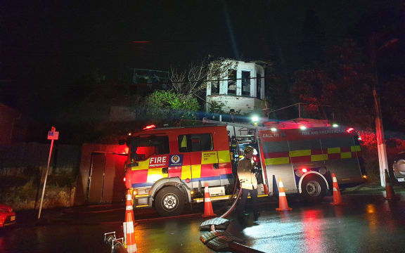A fire truck outside a house on Hanson St, Newtown, gutted by fire.