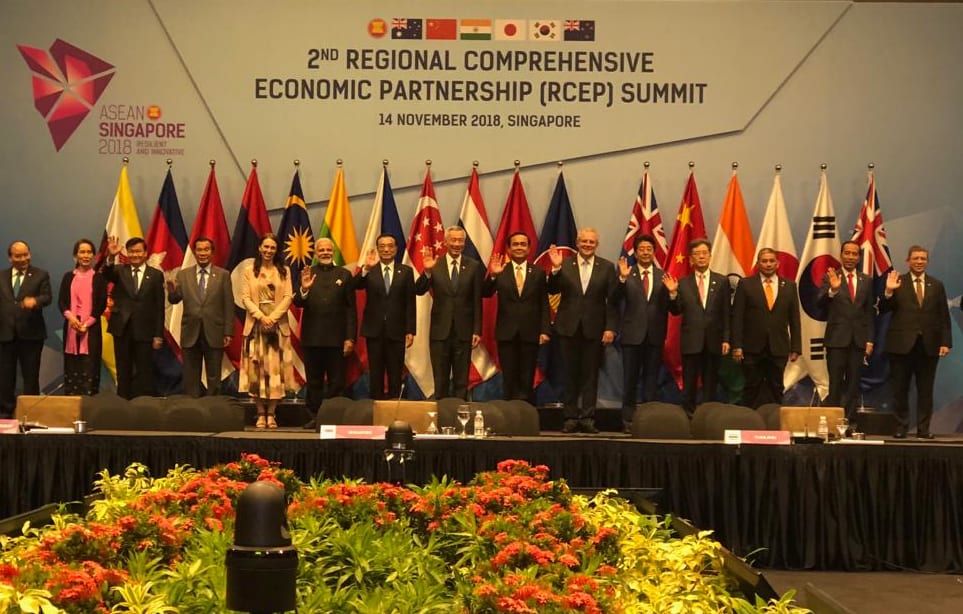 Prime Minister Jacinda Ardern stands with RCEP leaders at the summit in Singapore.