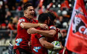 David Havili of the Crusaders cheerleaders Bryn Hall of the Crusaders try during the Quarter Final Super Rugby match, Crusaders V Sharks.