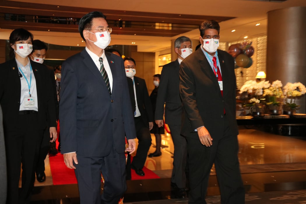 Taiwan Foreign Minister Joseph Wu and (to his left) President Surangel Whipps Jr in Taipei, 30 March 2021.