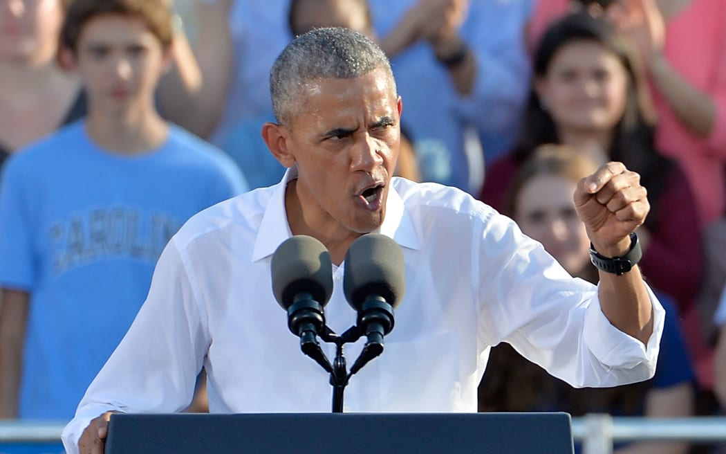 President Barack Obama speaks to a crowd of 16,000 people while campaigning for Democratic Presidential nominee Hillary Clinton