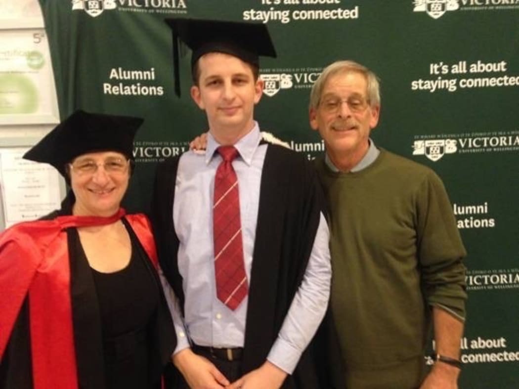 Kelly Savage with his mother, Martha, and father, Michael, during his graduation from Victoria University with a BA in Japanese and Psychology. His mother is a professor of geophysics at the university.