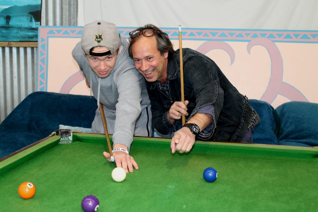 Youth social worker Steffen Lindner with Timmahl James Jackman