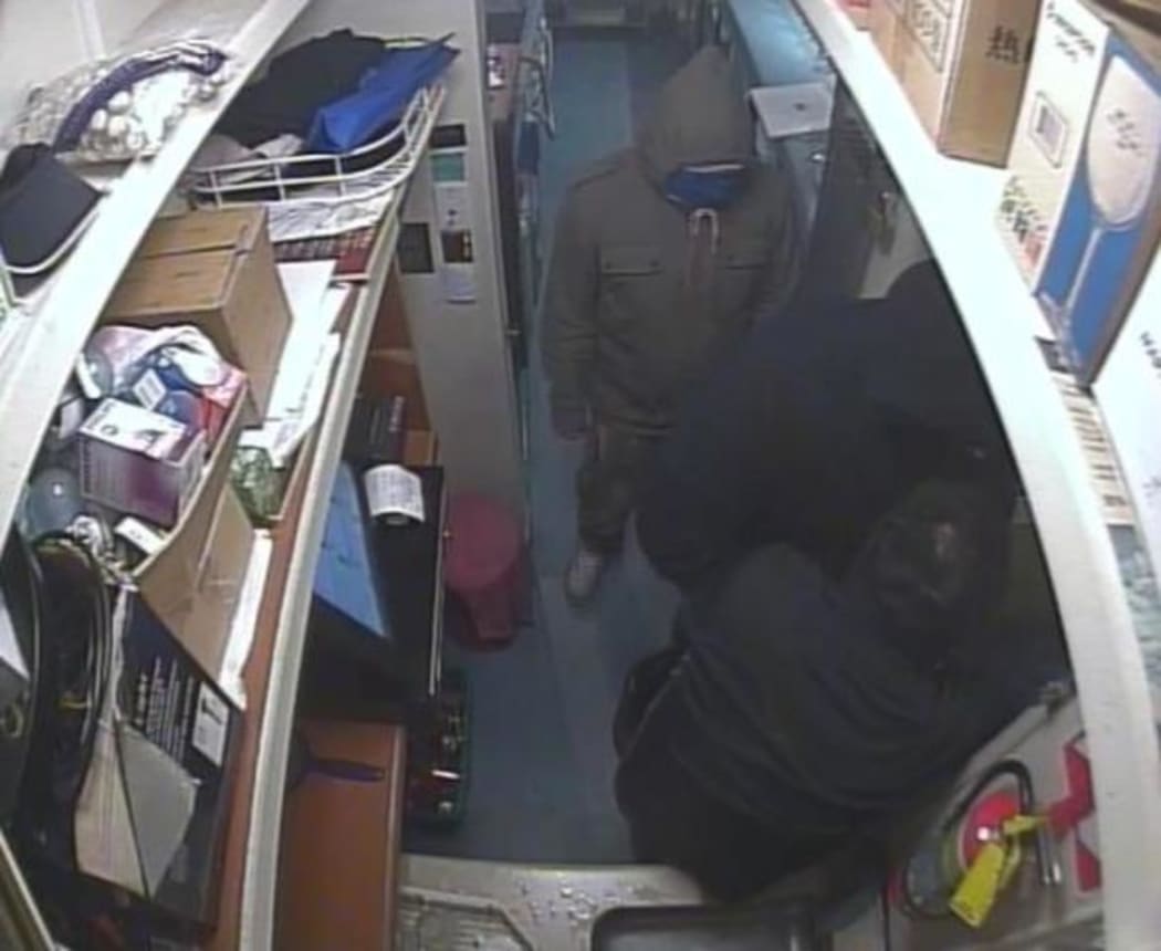 Police are calling for help identifying two men captured on CCTV cameras robbing a bar last night.