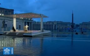 Pope Francis praying in an empty St Peter's Square, while Rome is in lockdown due to Covid-19.
