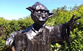 The stolen sculpture of Yoda.