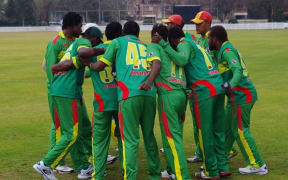 Vanuatu players come together during a warm-up match in Sydney.