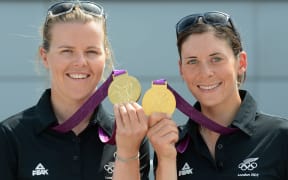 New Zealand's 470 Sailing Gold Medalists Olivia Powrie and Jo Aleh pose for a photo at Olympic Park during the London Olympic Games.