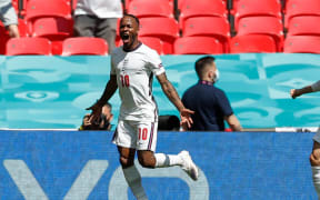 England's Raheem Sterling celebrates