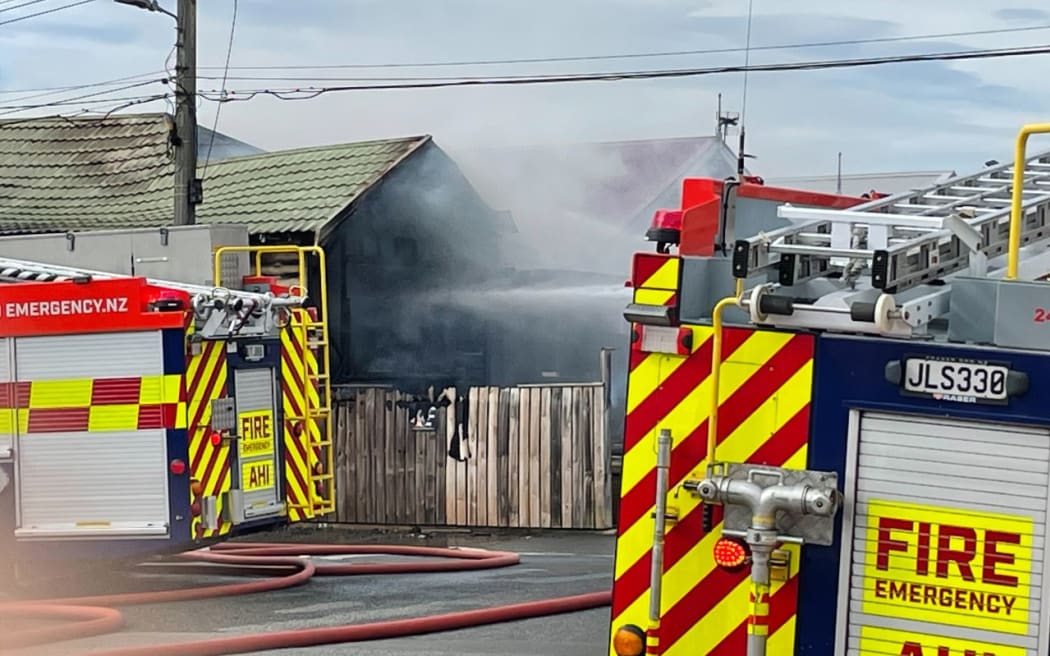 Firefighters tackling the house fire in Kilbirnie, Wellington